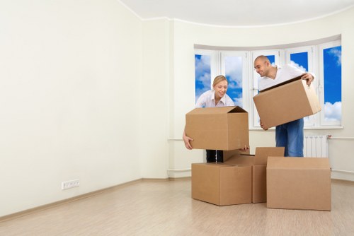 Professional movers handling furniture in Totteridge