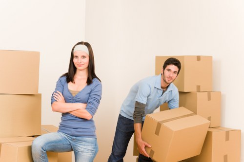 Customer and movers finalizing the move with a handshake